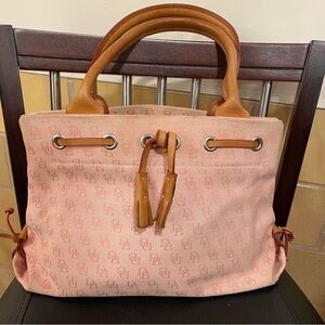 DOONEY AND BOURKE light pink signature logo print, tassel, canvas purse.